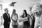 Couple signing modern mosaic ketubah by Studio Yarden